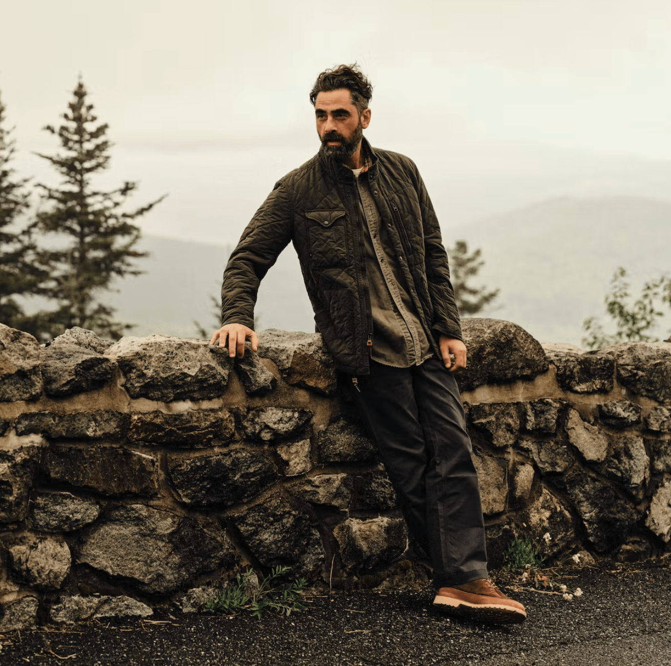 a man standing on a rock