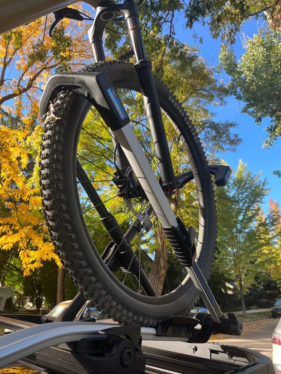 a bicycle wheel on a bike rack