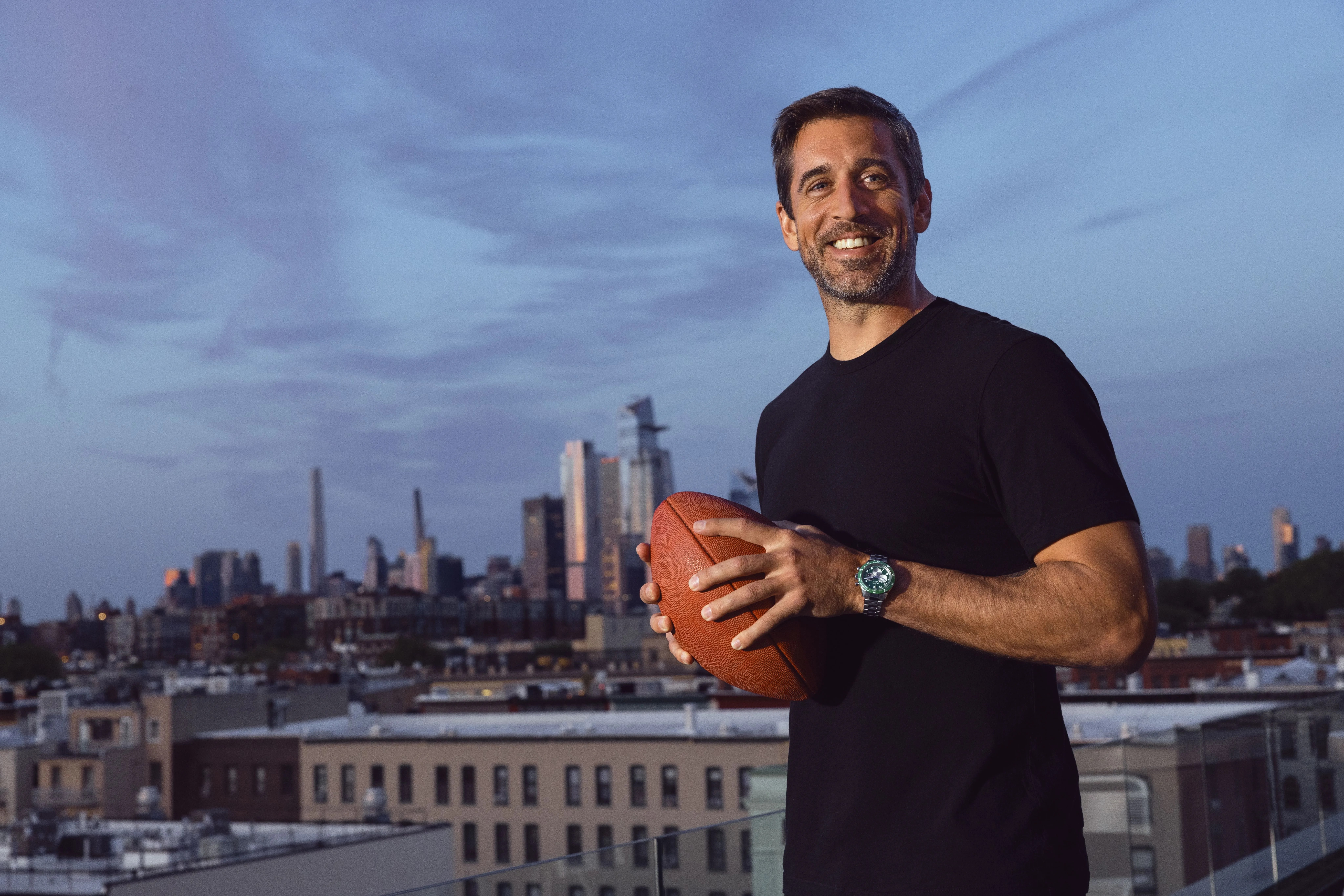 nfl quarterback aaron rodgers wearing a zenith watch