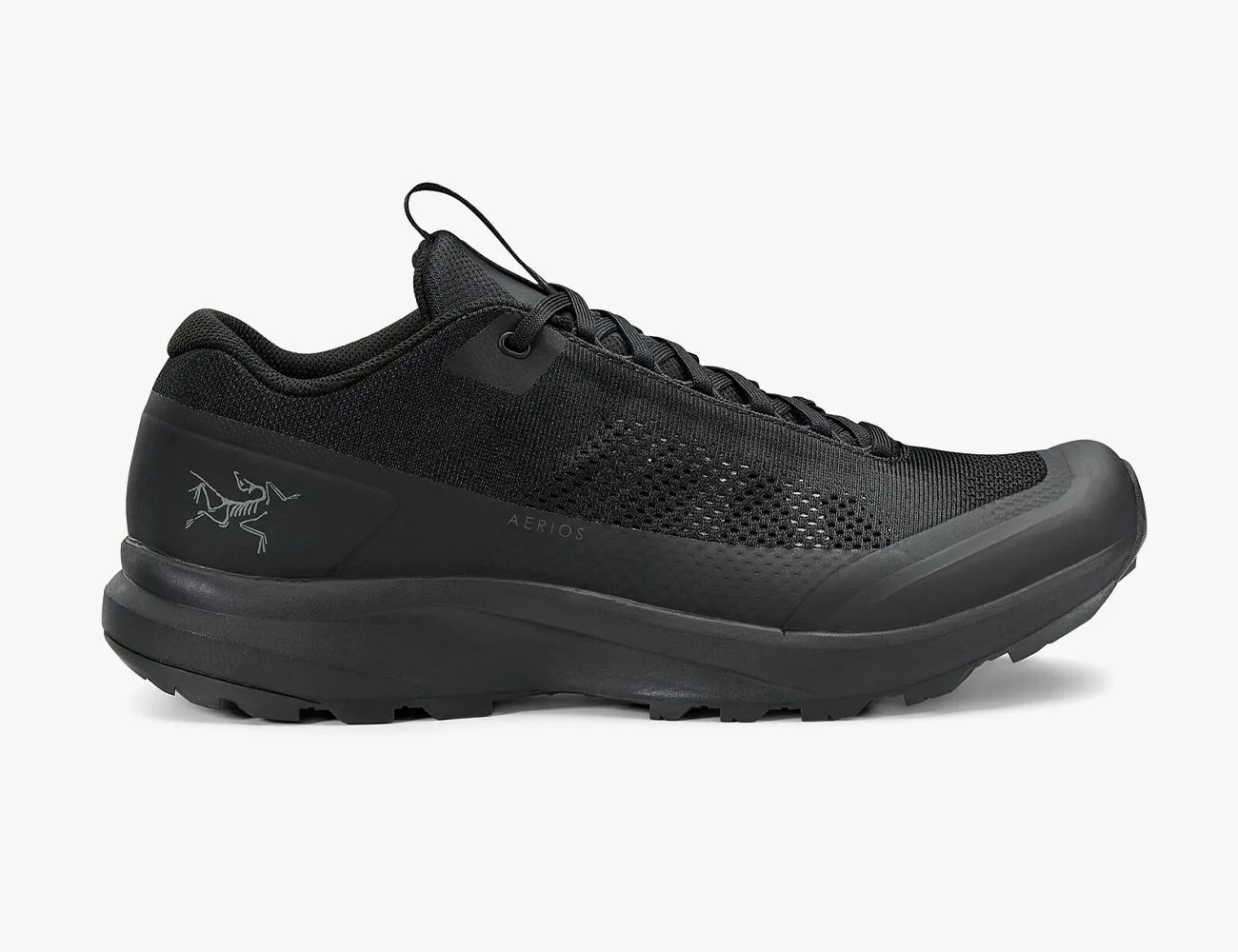 a black shoe with a white background