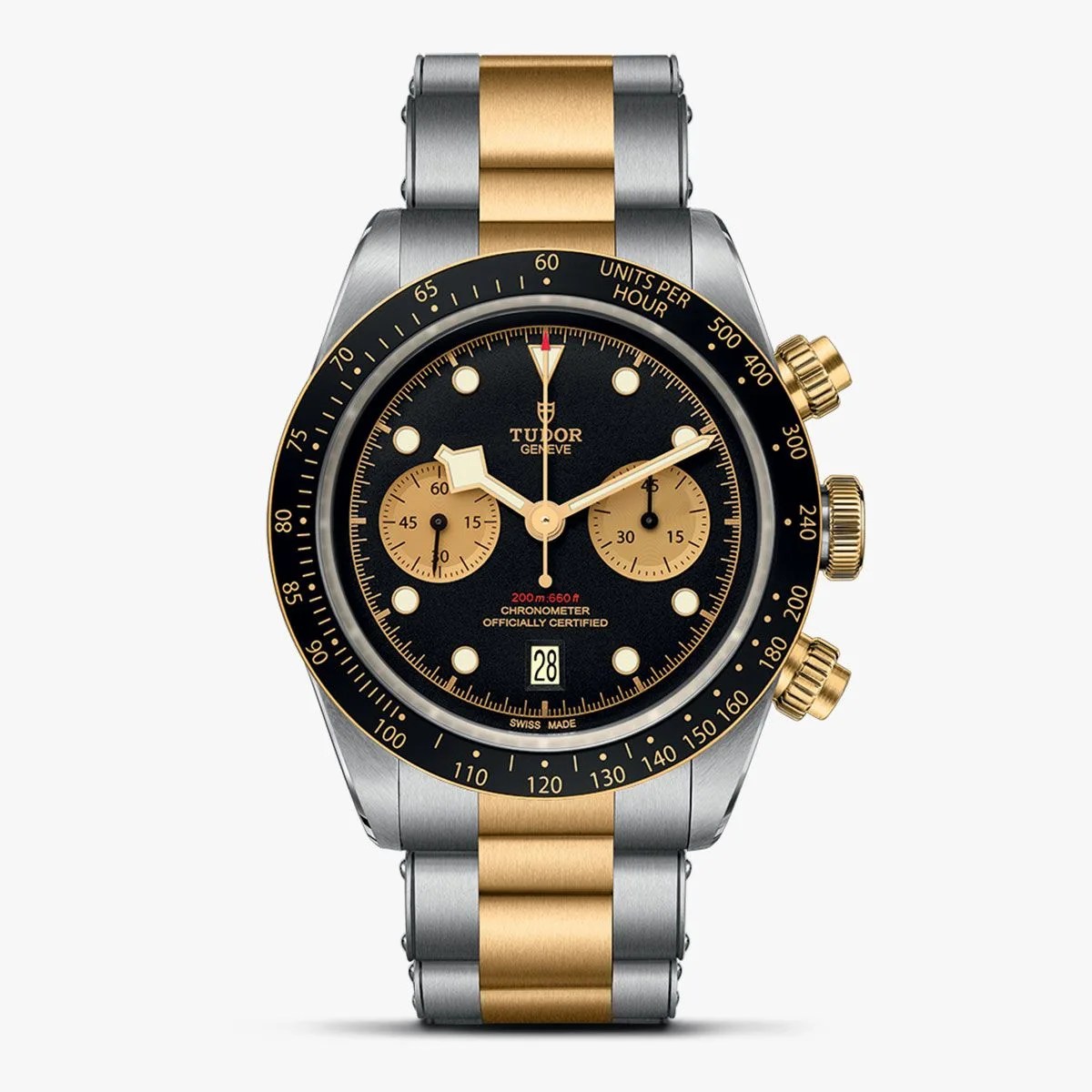 a black watch with a gold band