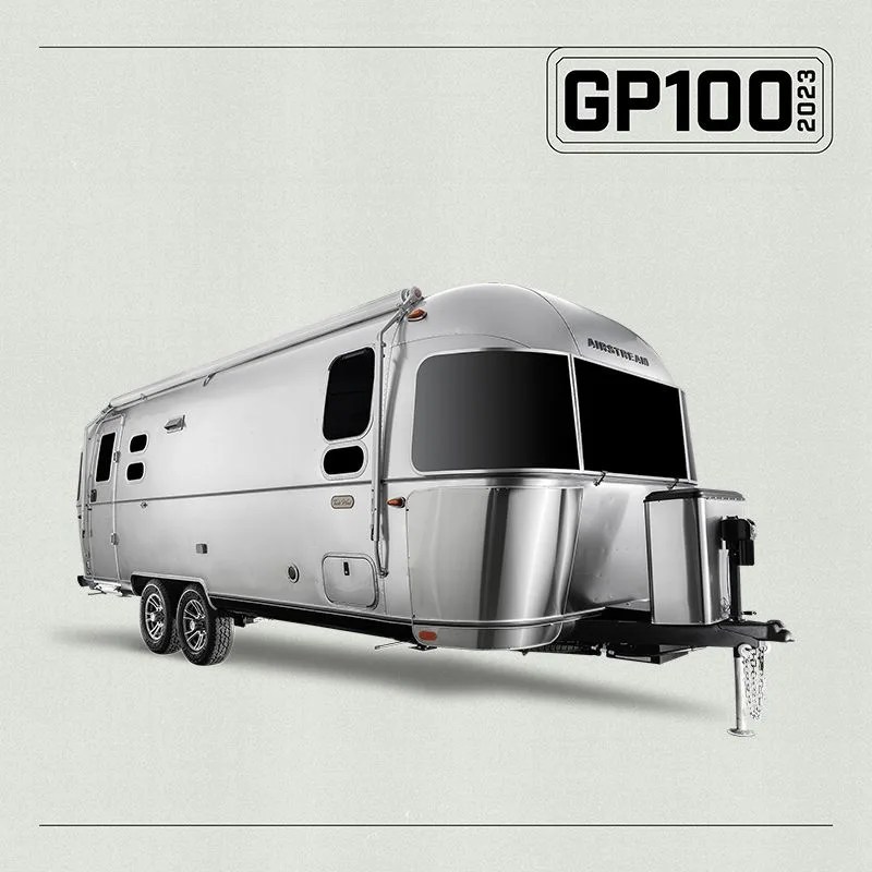 a silver trailer with a door