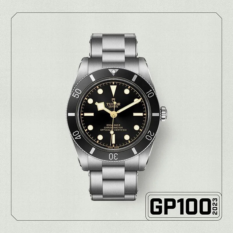 a black watch and silver watch