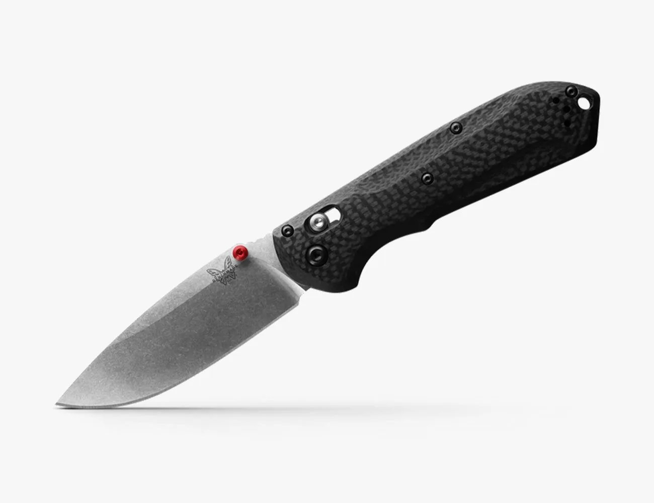 a knife with a black handle