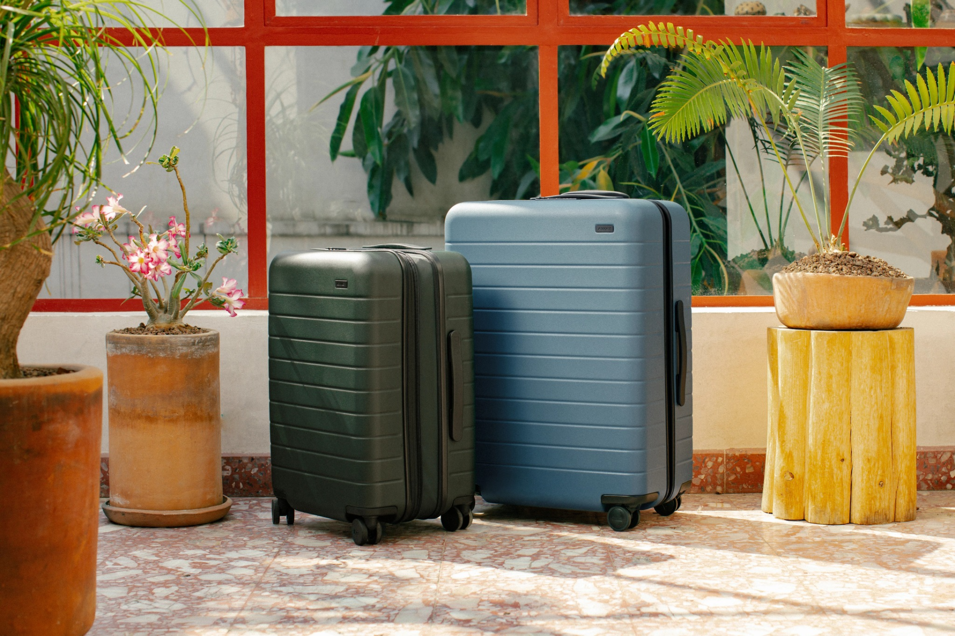 two suitcases in a hotel lobby