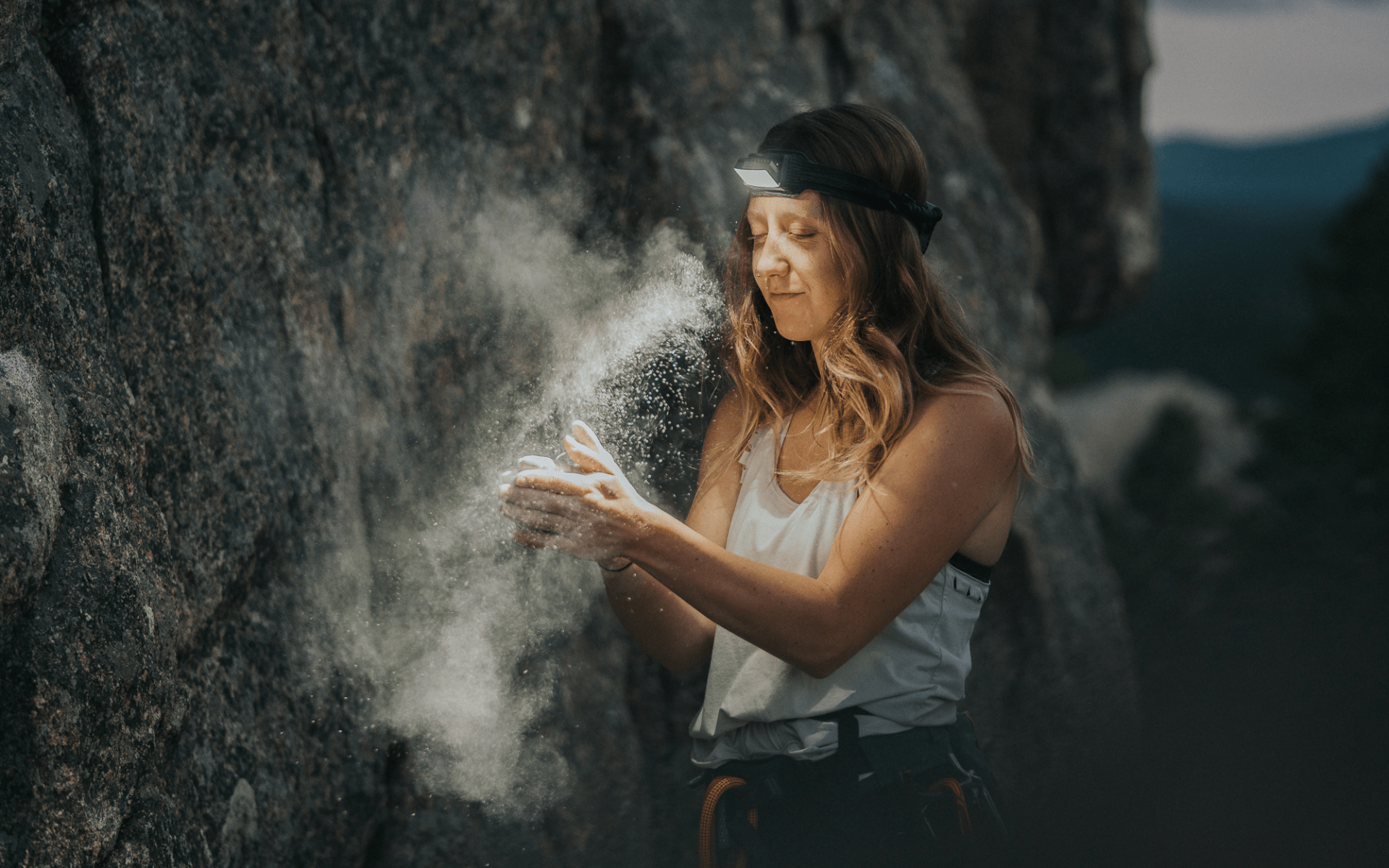 a woman holding a rock