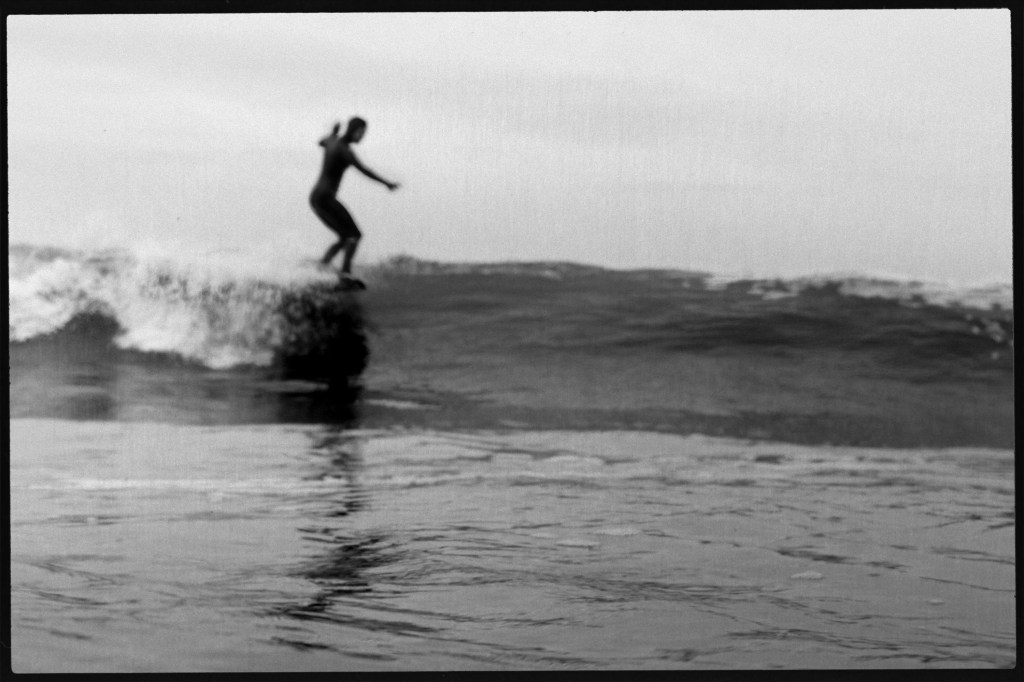 a man surfing on the waves