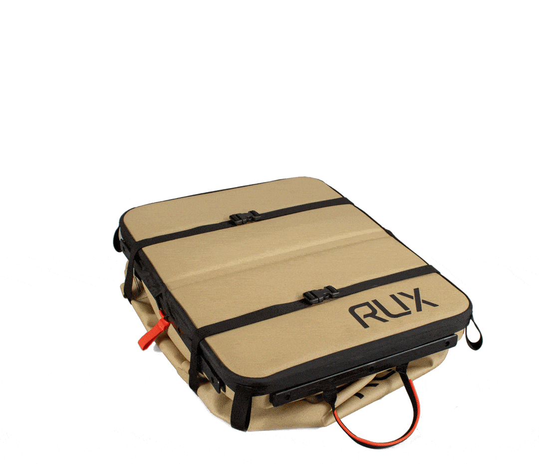 showing how the rux 70l storage bin can collapse down flat
