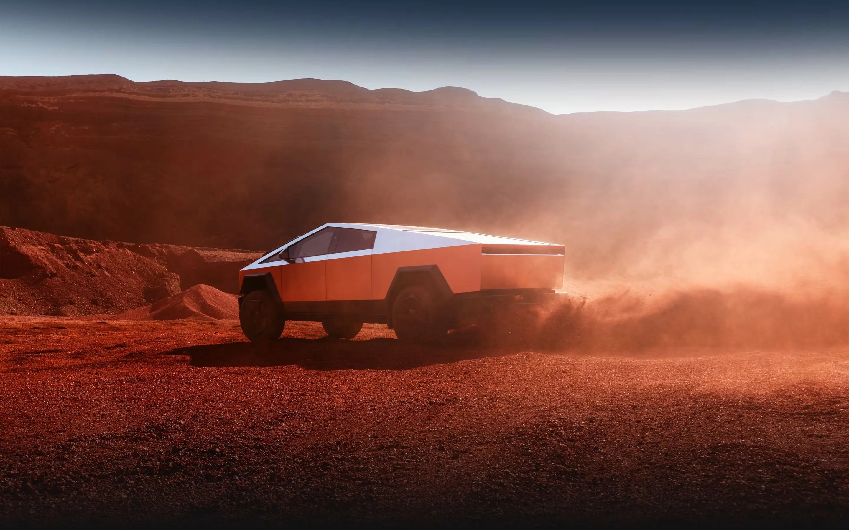 a car driving on a dirt road