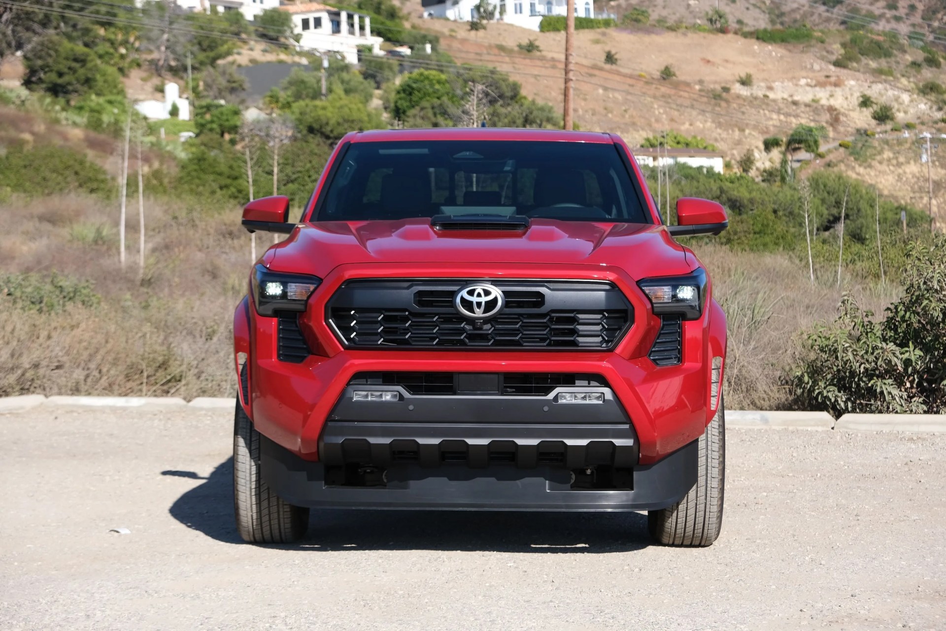 2024 toyota tacoma in beach parking lot