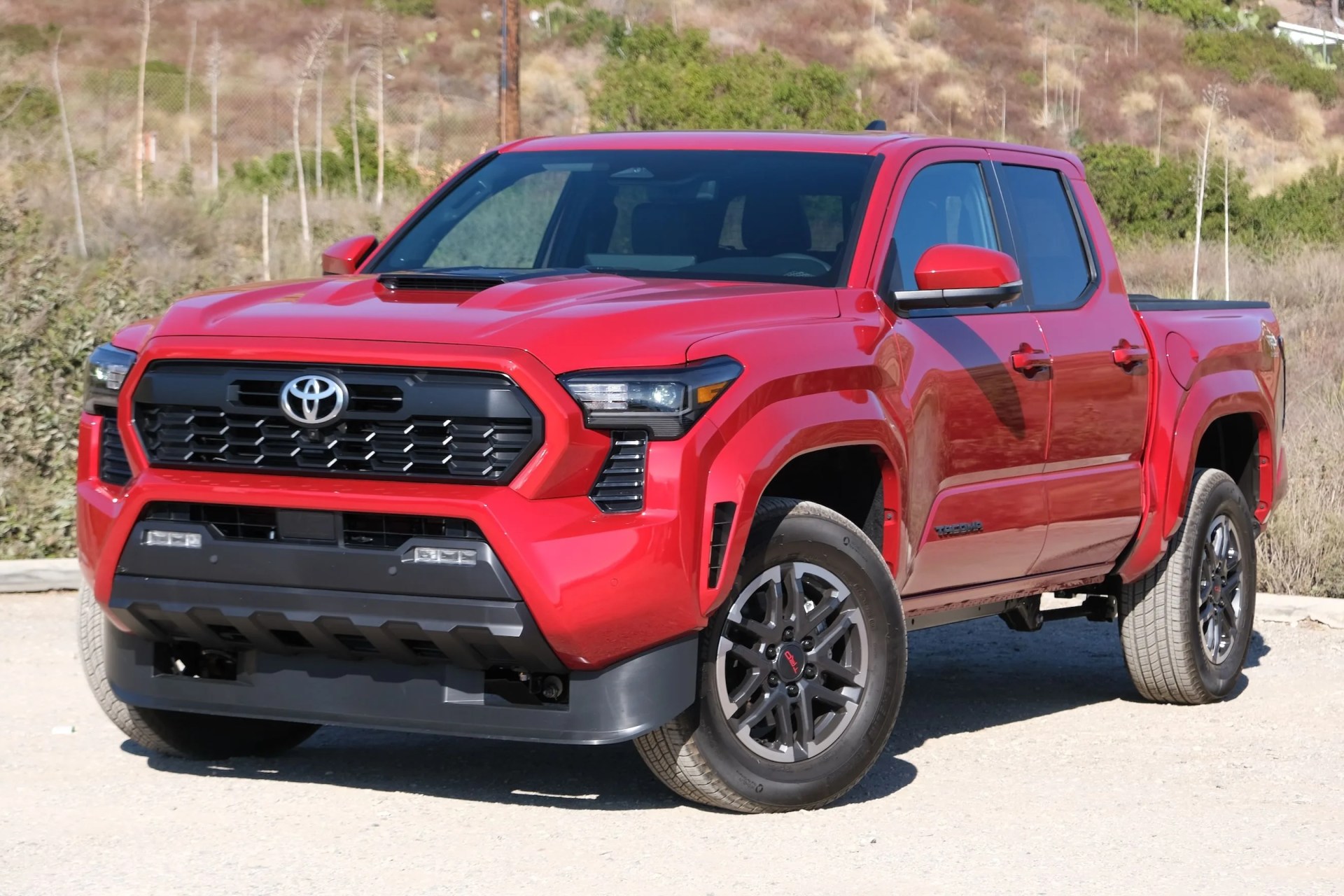 2024 toyota tacoma in a beach parking lot