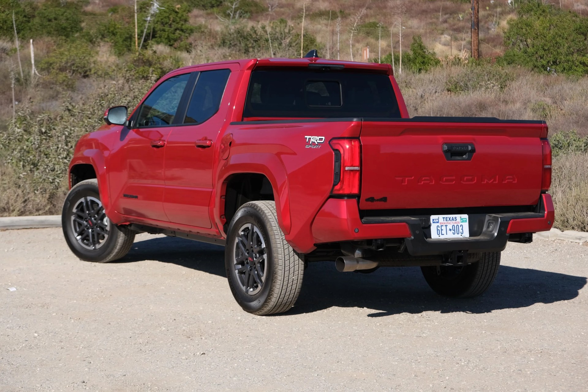 2024 toyota tacoma in beach parking lot