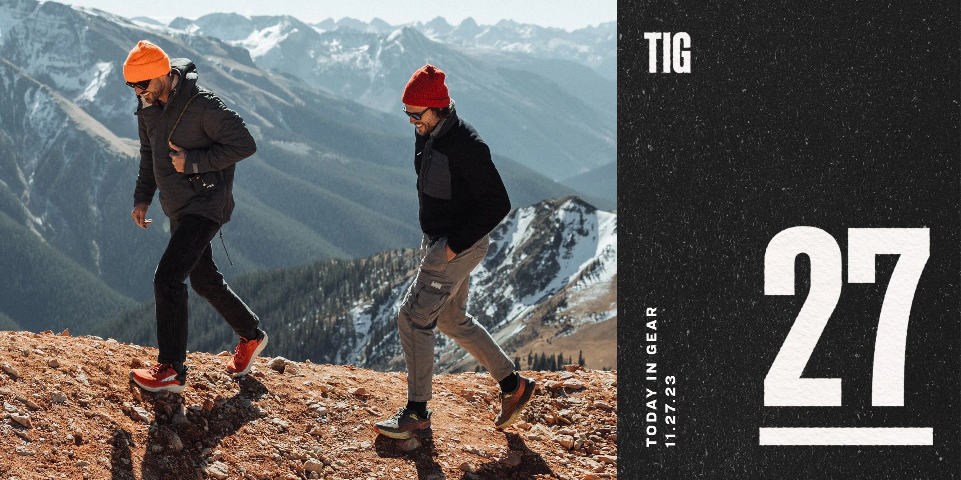 two men walking on a mountain