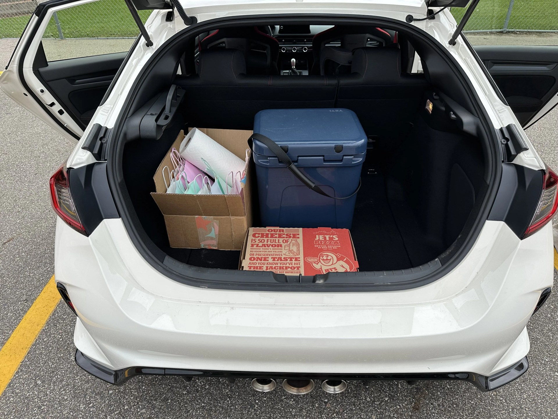 a car trunk with luggage in it