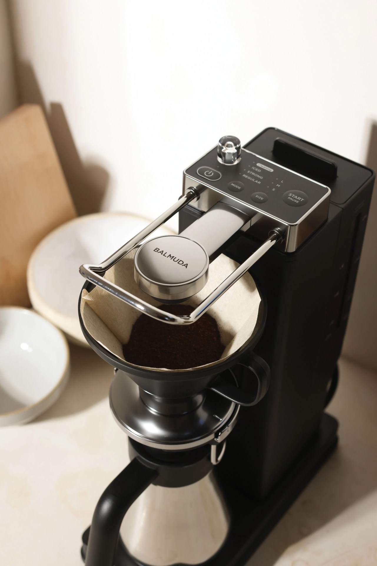 a close up of a coffee maker