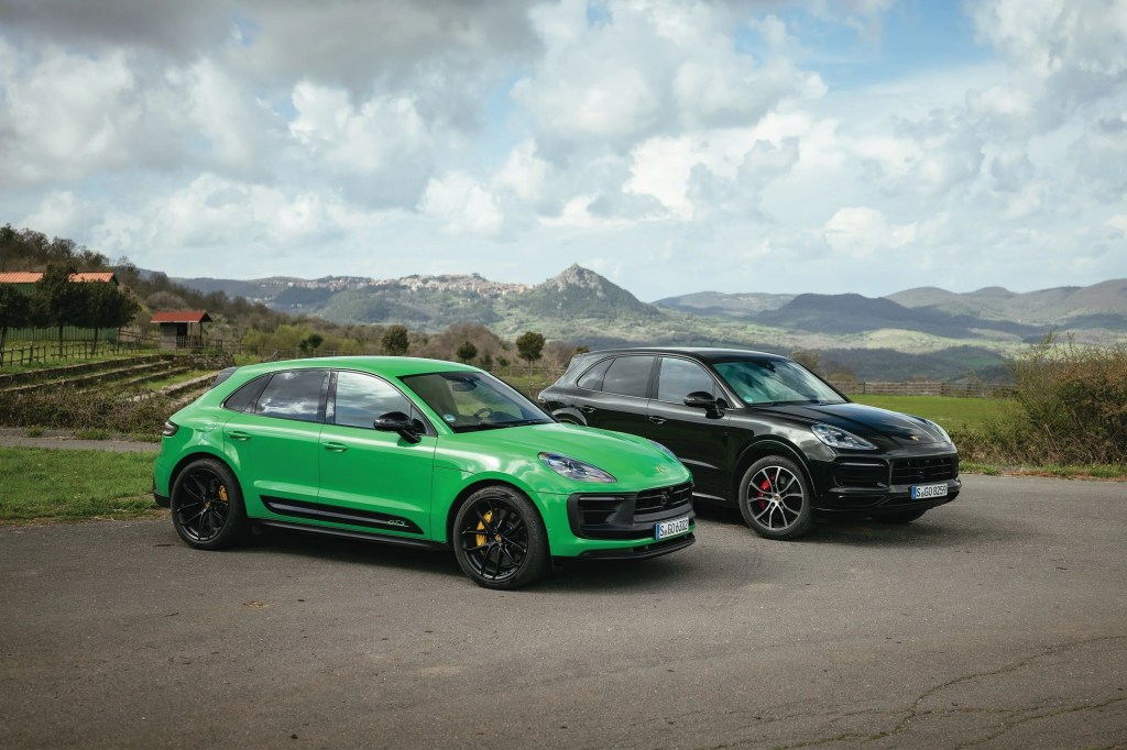 two porsche macan's parked