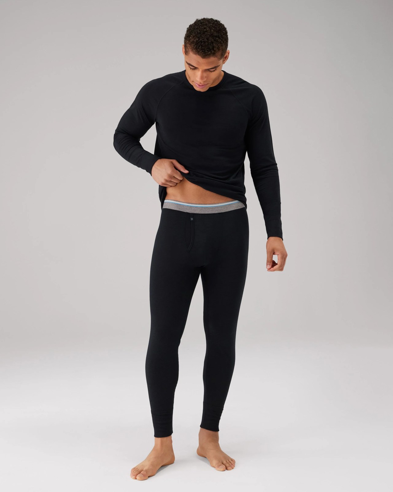 a man wearing mack weldon merino base layer