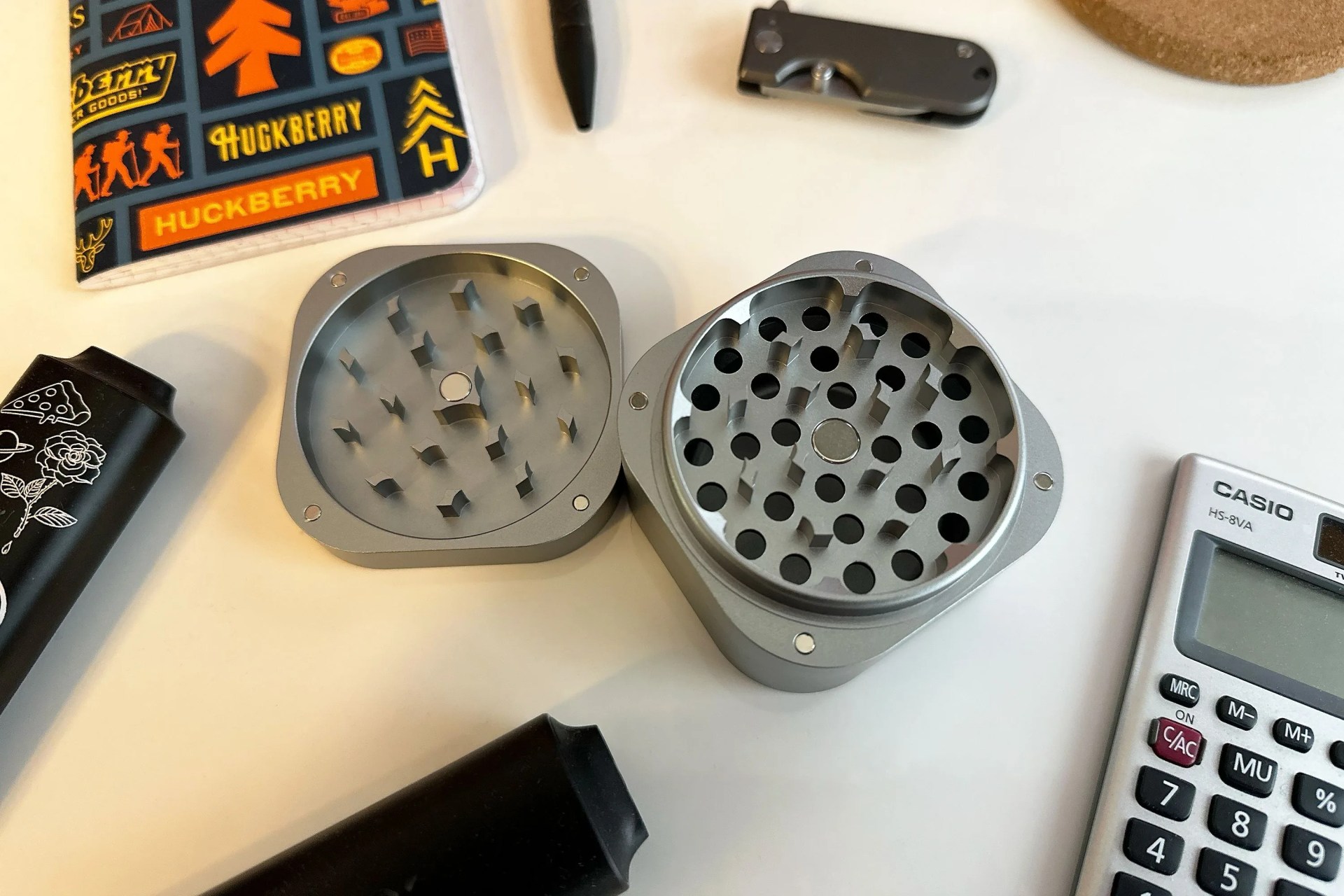 a weed grinder on a table