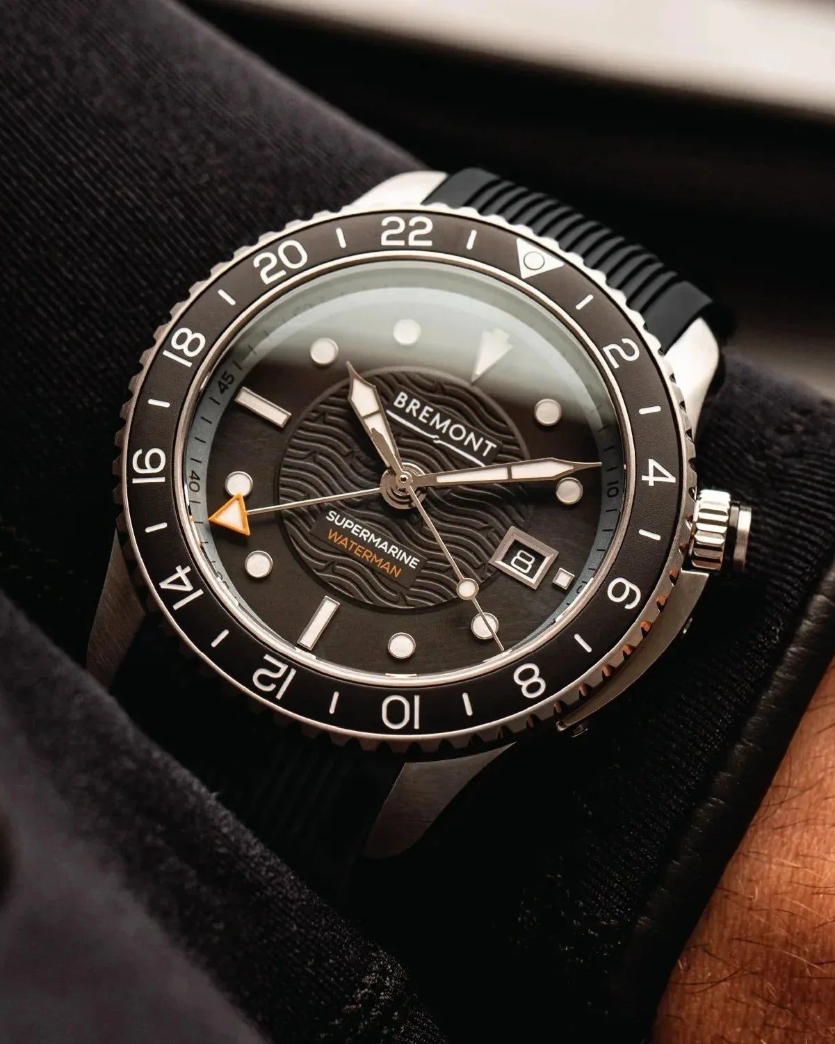 a bremont waterman apex ii watch on a person's wrist