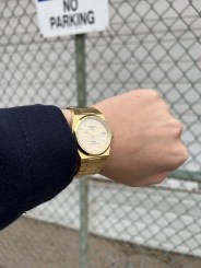 a person holding a watch