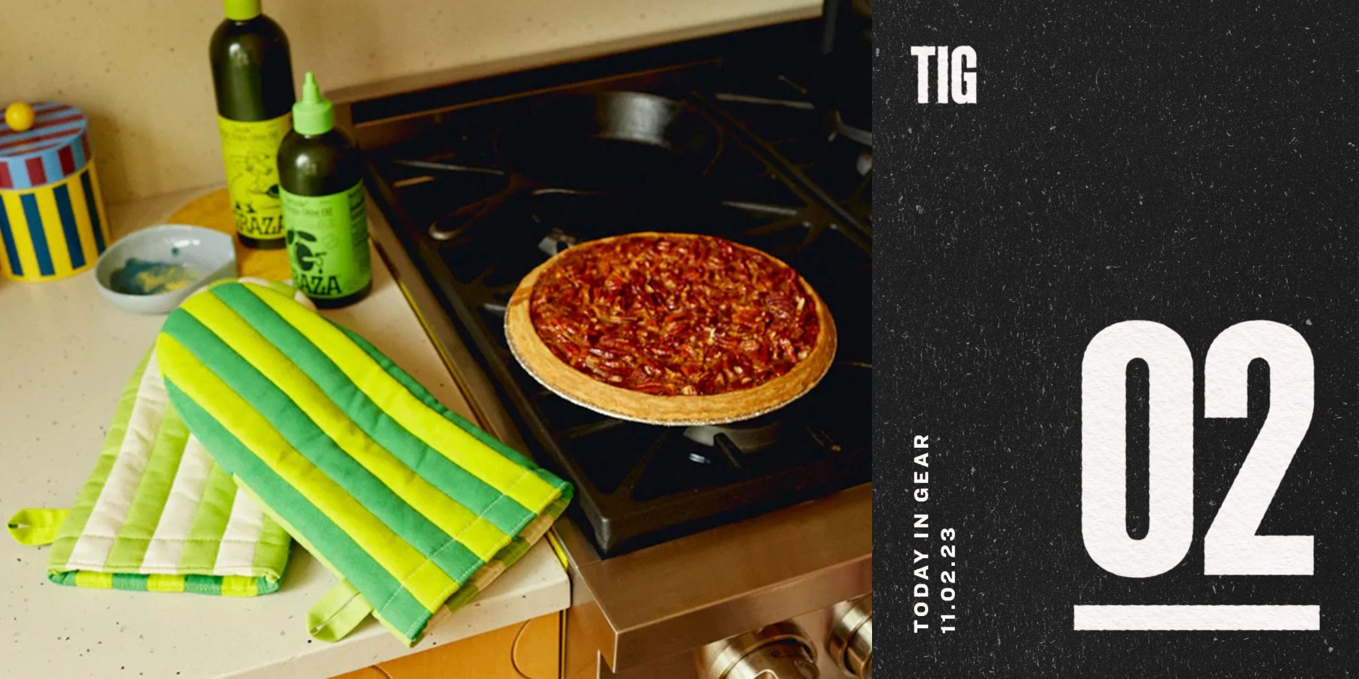 today in gear november 2 2023 a pizza in a pan on a stove next to graza mitts and olive oil