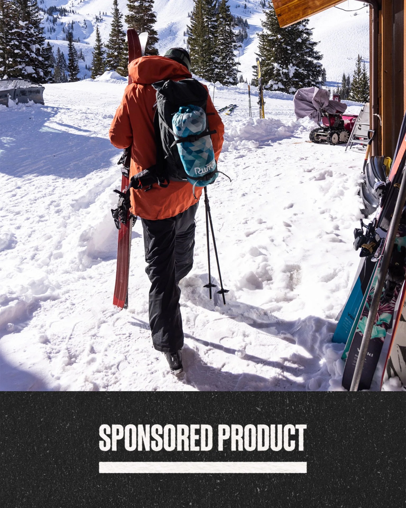 today n gear november 17 2023 a person with rumpl blanket attached to backpack walking in the snow