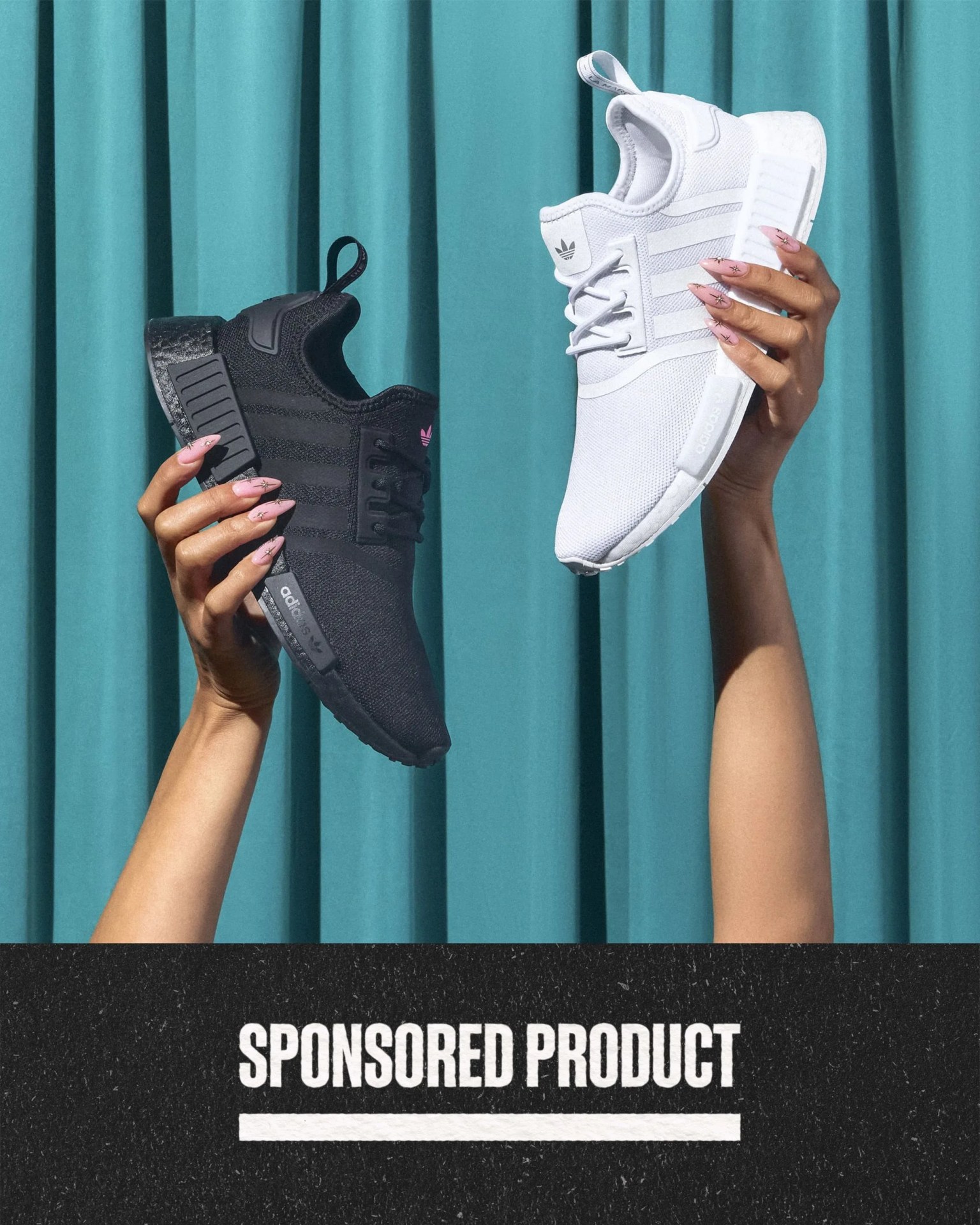 sponsored product a person holding up a pair of adidas white sneakers