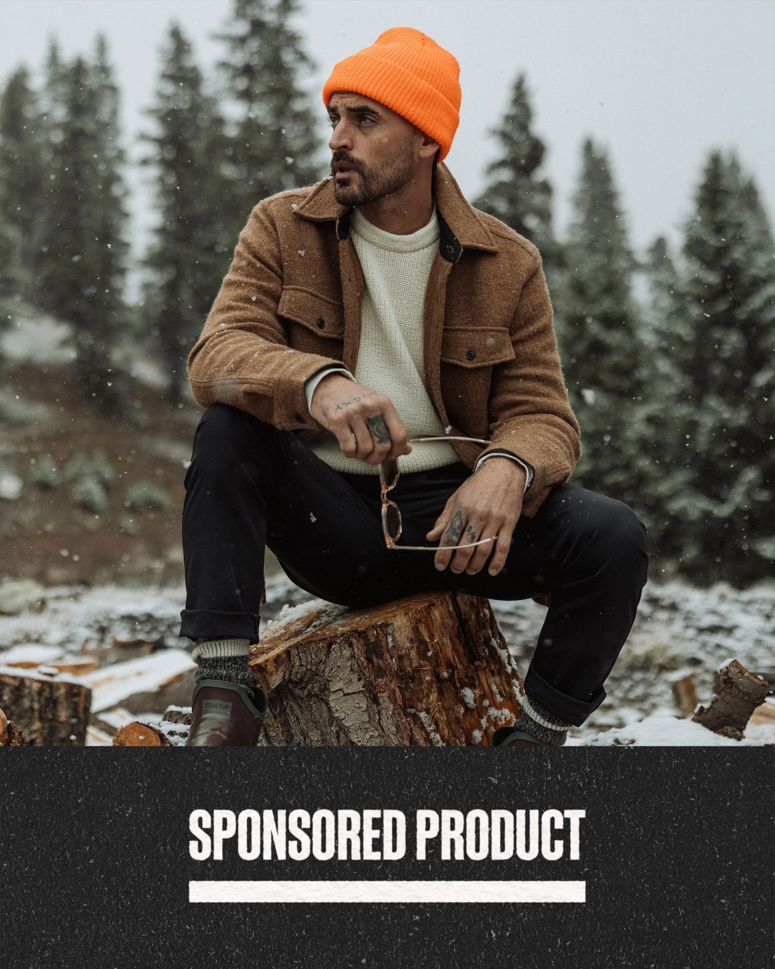 sponsored product a man sitting on a log
