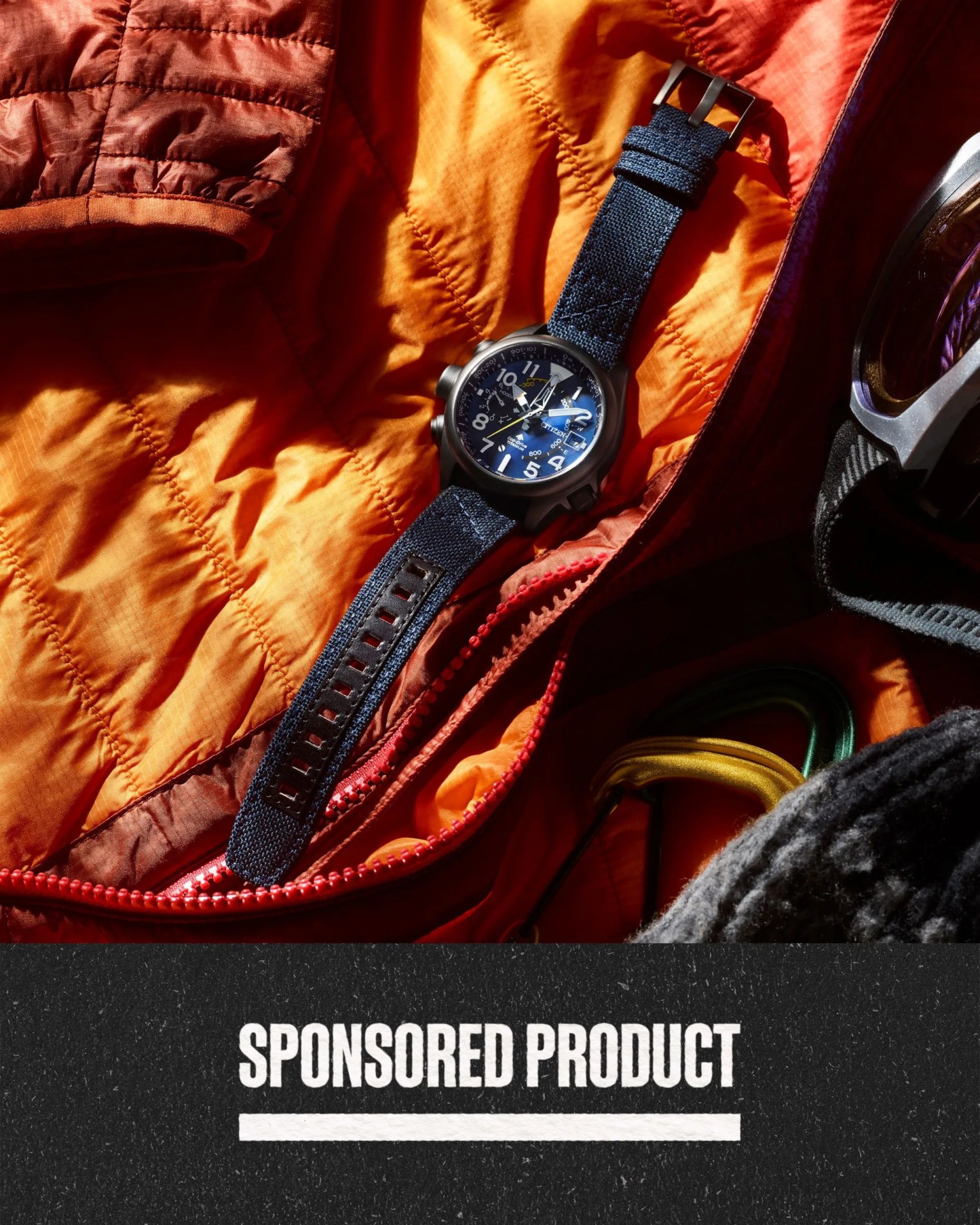 a watch laying on a jacket