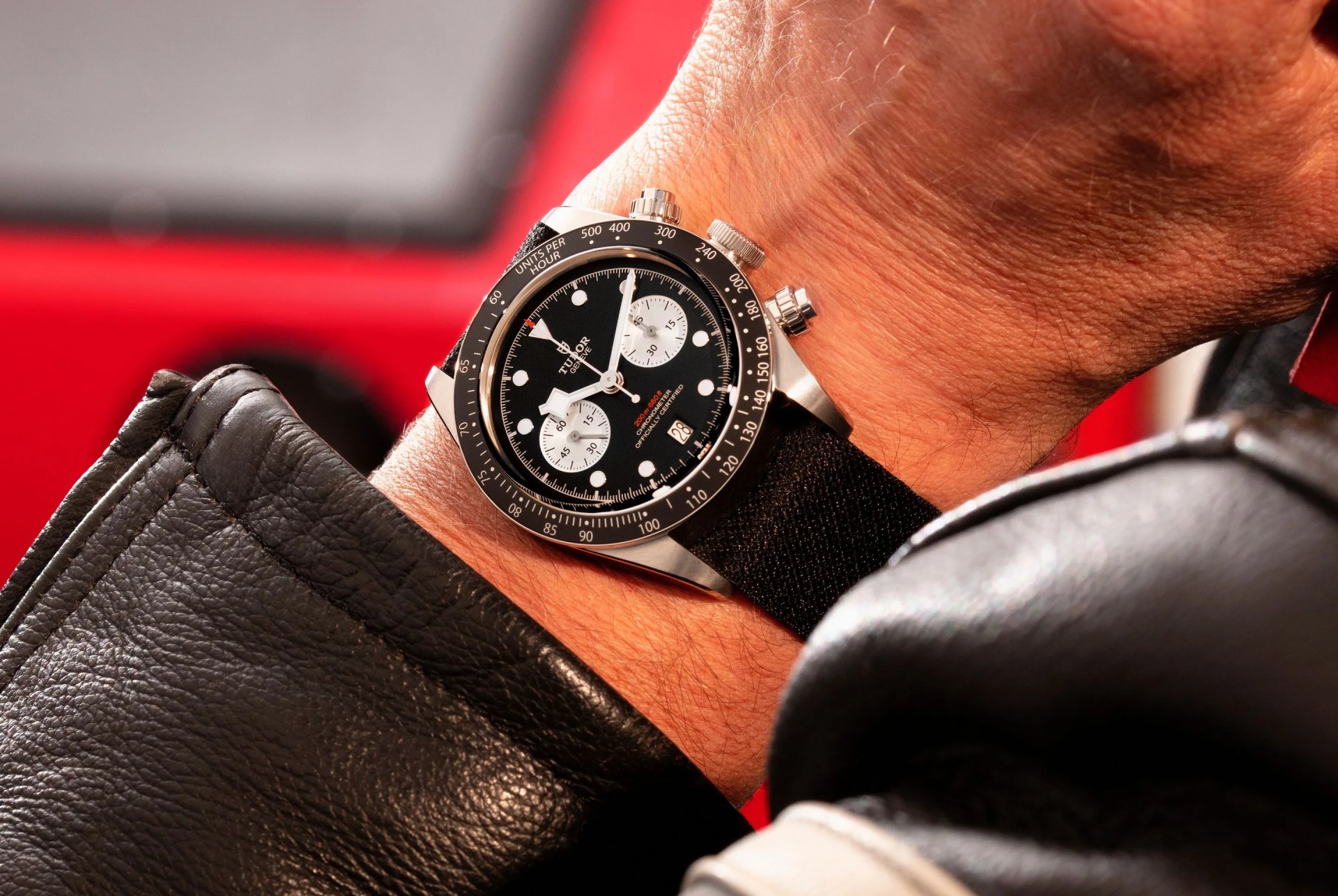 a man wearing a tudor watch