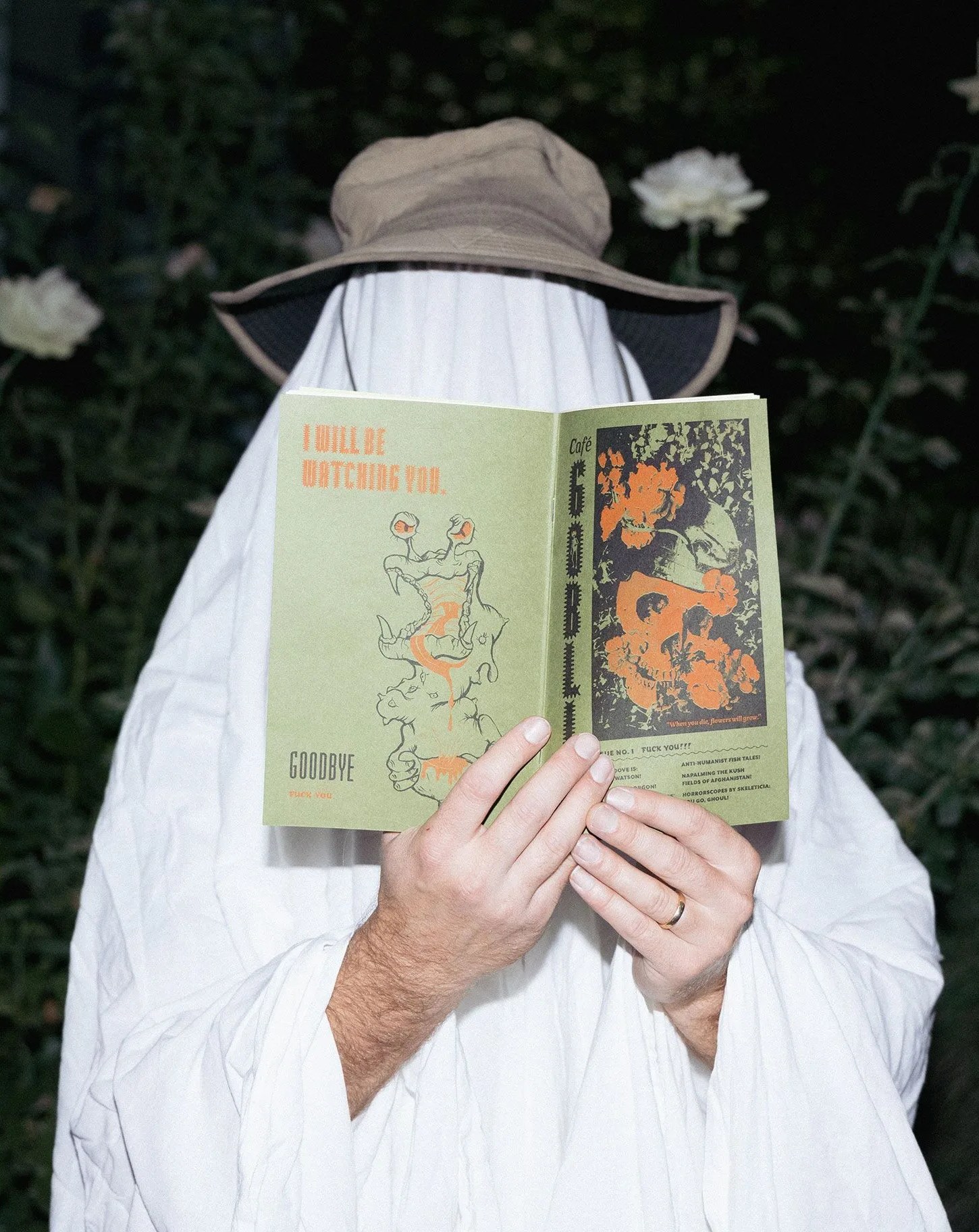 a person reading a cafe goblin issue one
