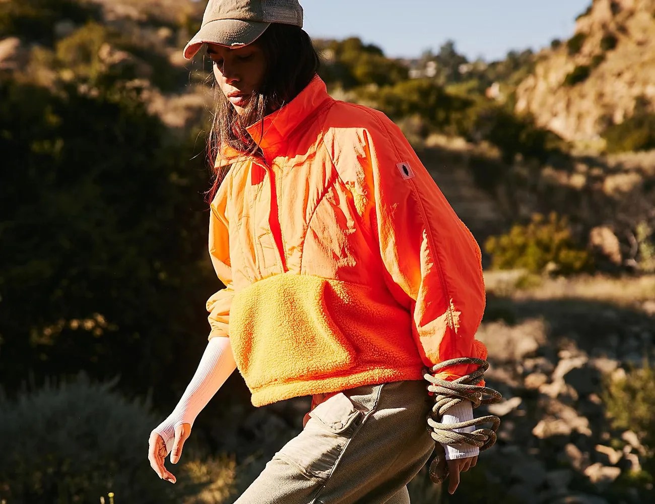 a woman wearing a puffer jacket outside