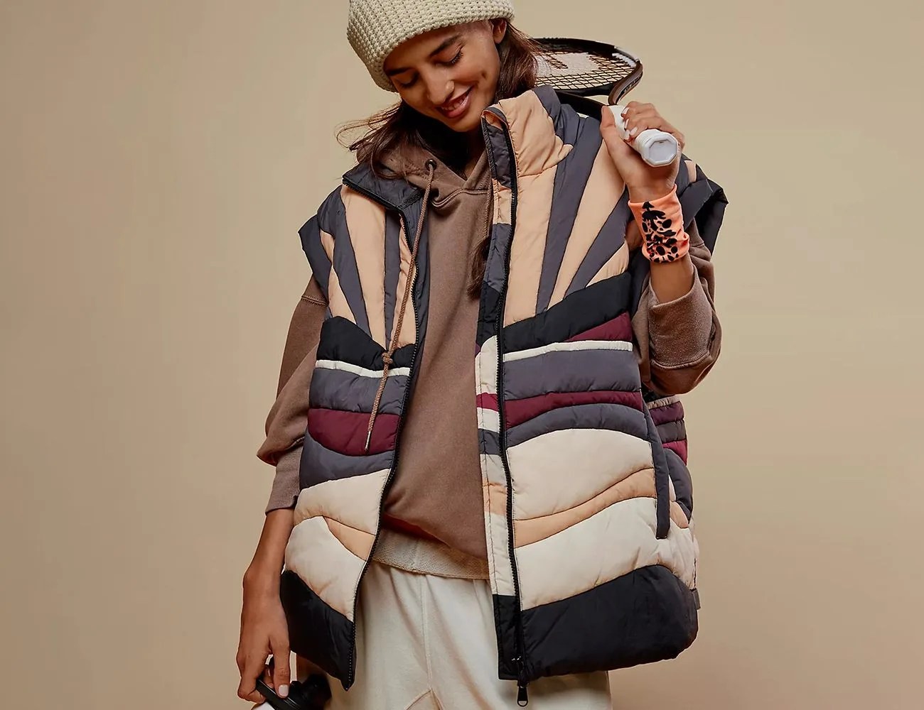 a woman wearing a puffer jacket outside
