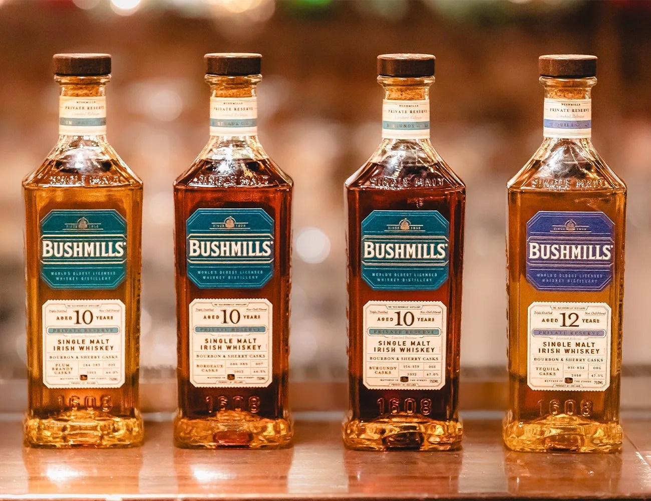 four bottles of alcohol