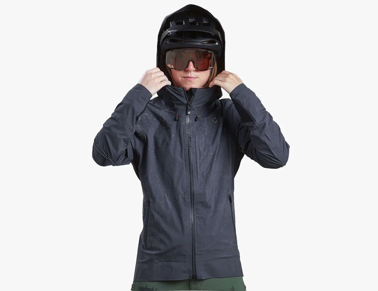 a woman wearing a jacket, helmet and goggles