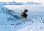 a person jumping in the air on skis