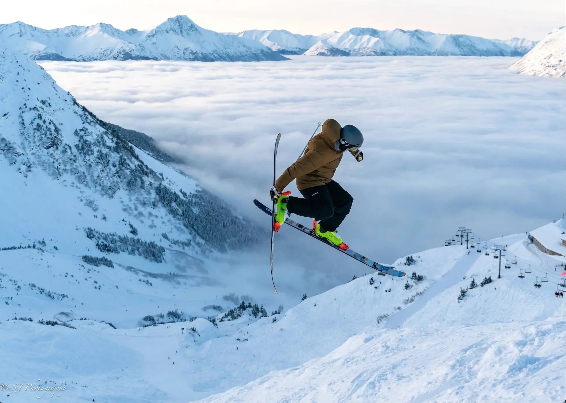 a person jumping in the air on skis