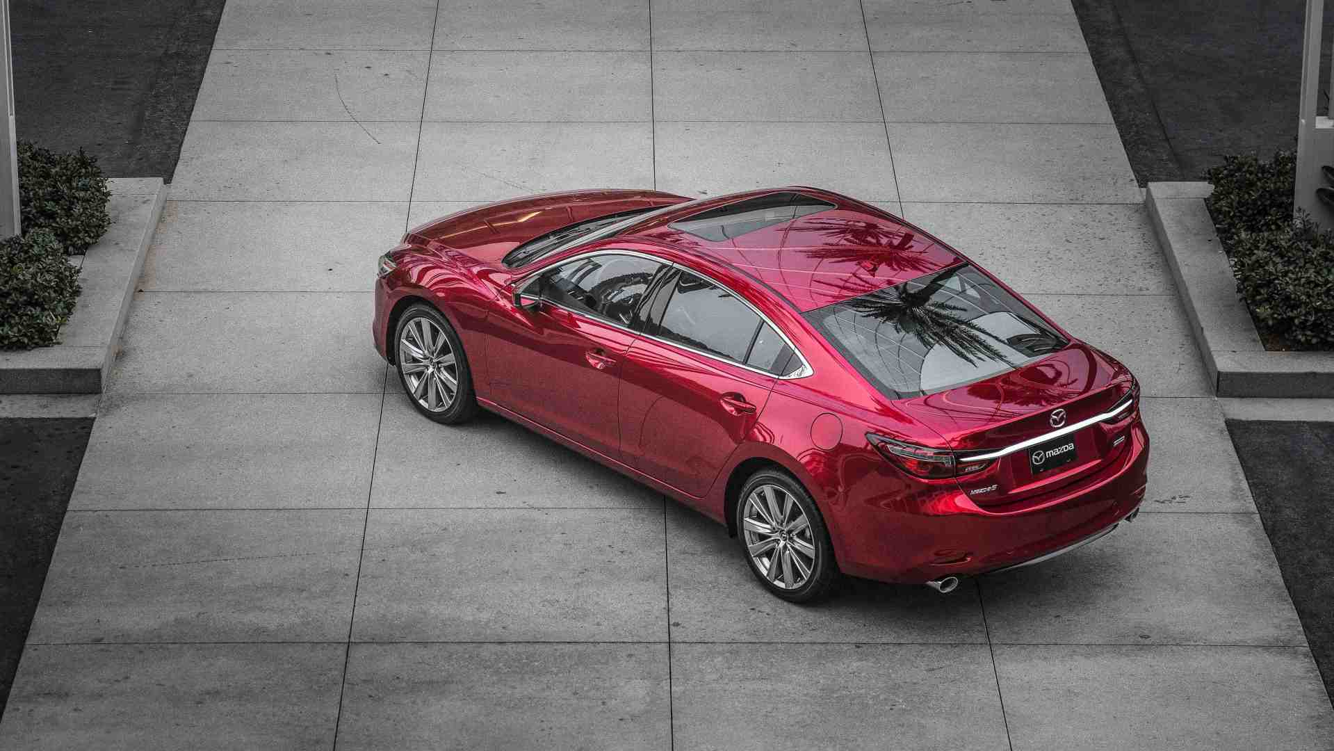 Mazda 6 parked on tiles