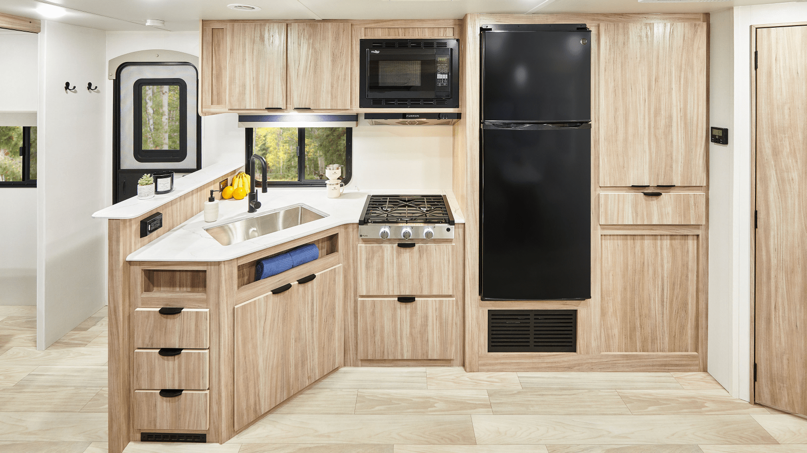 a kitchen with wooden cabinets