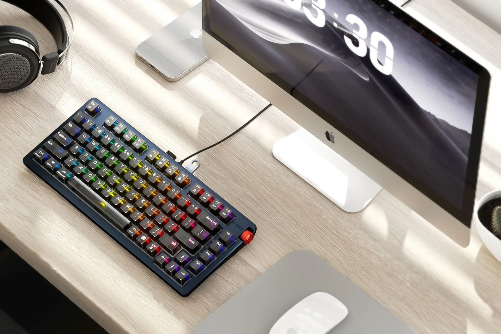 a computer with a rainbow keyboard