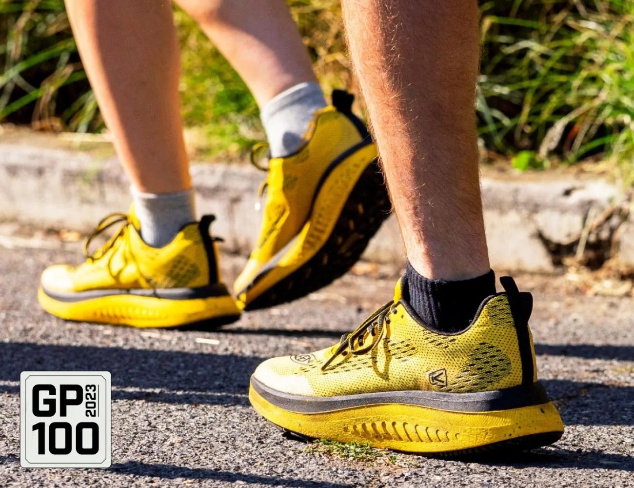 people wearing yellow running shoes