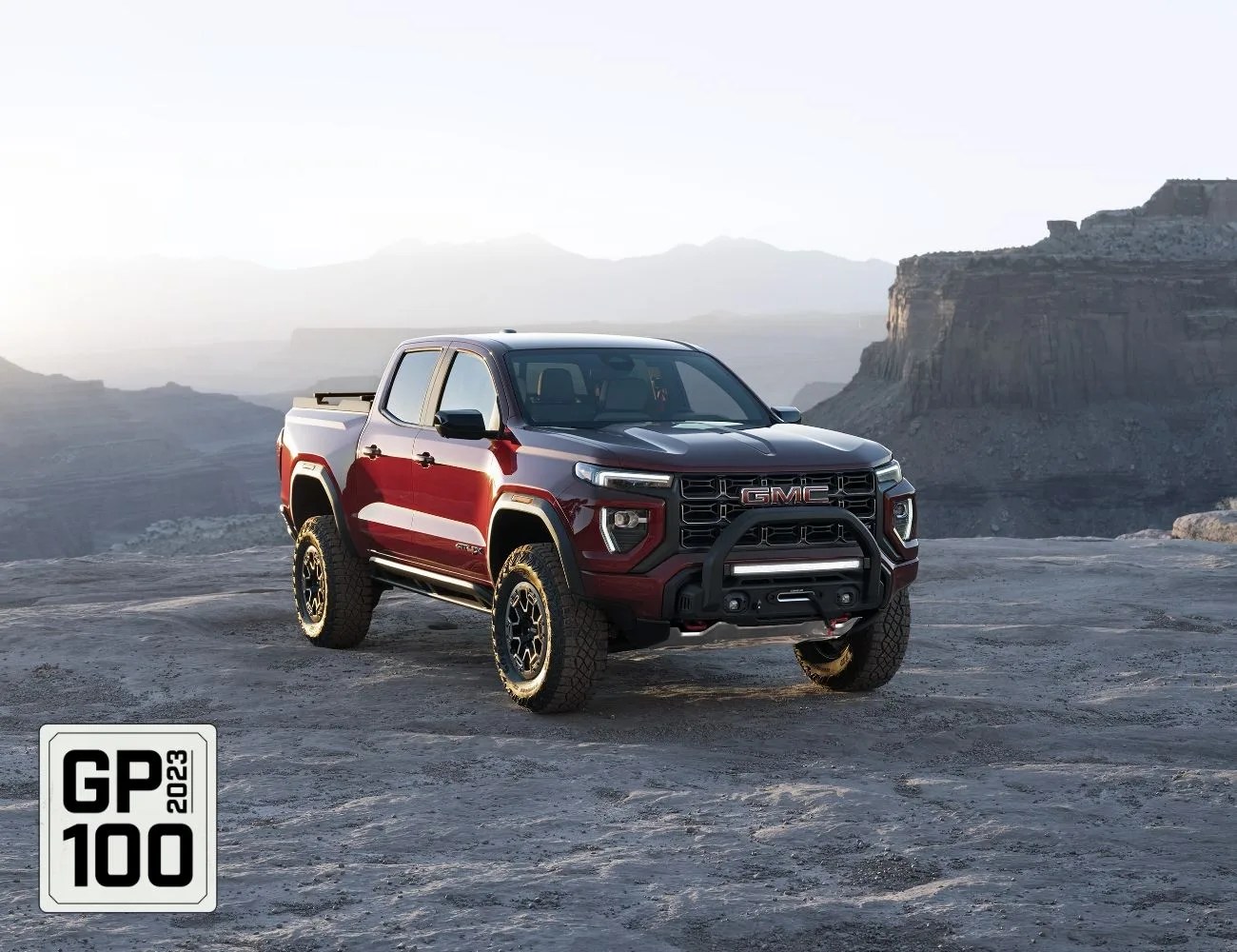 a truck parked on a rocky mountain