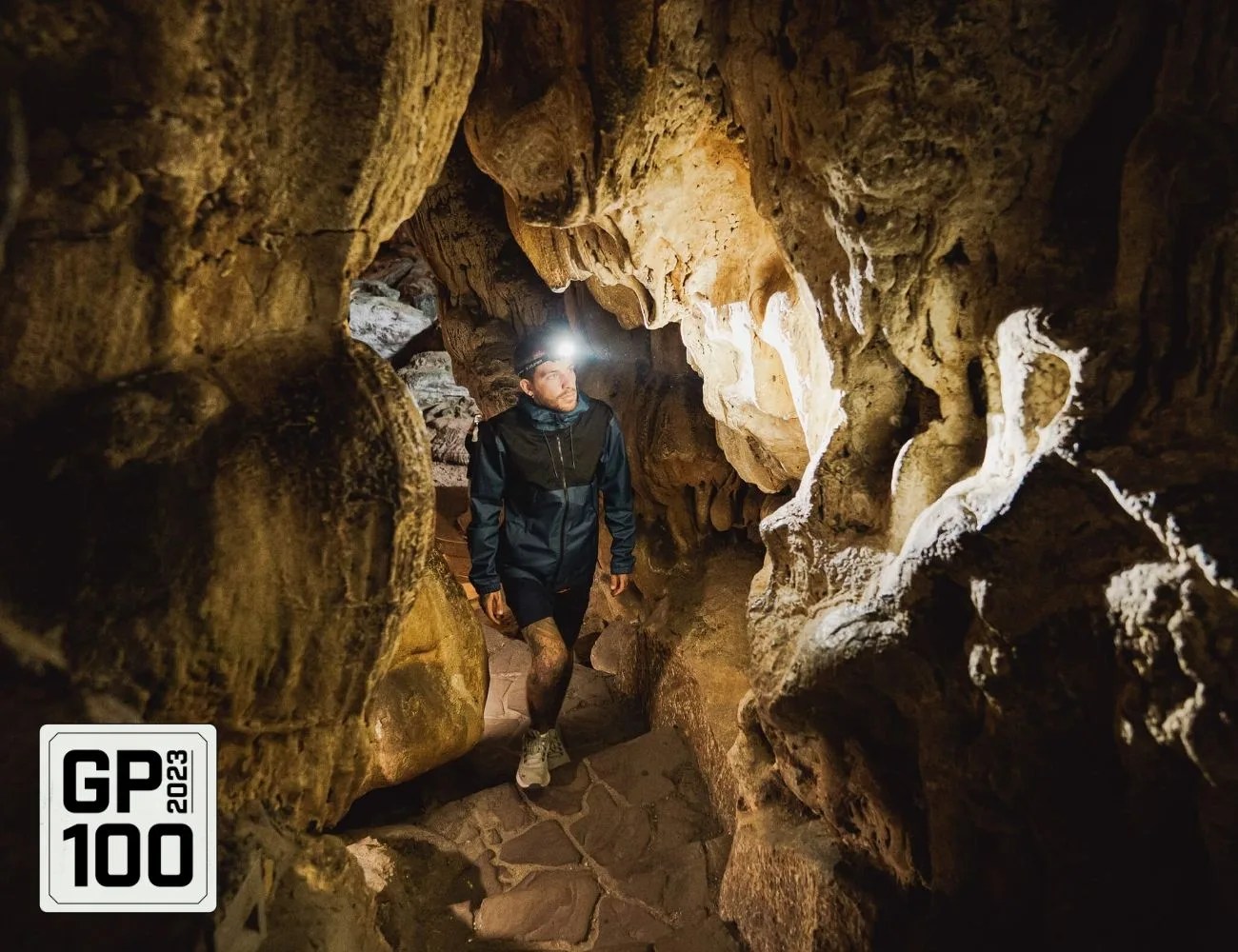 a man standing in a cave