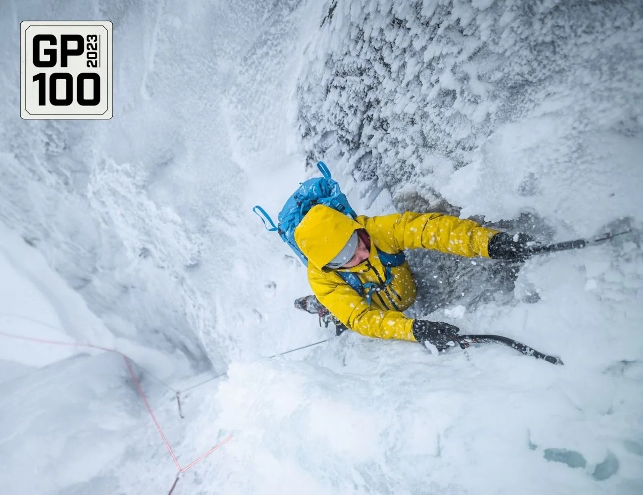 a person climbing in the snow