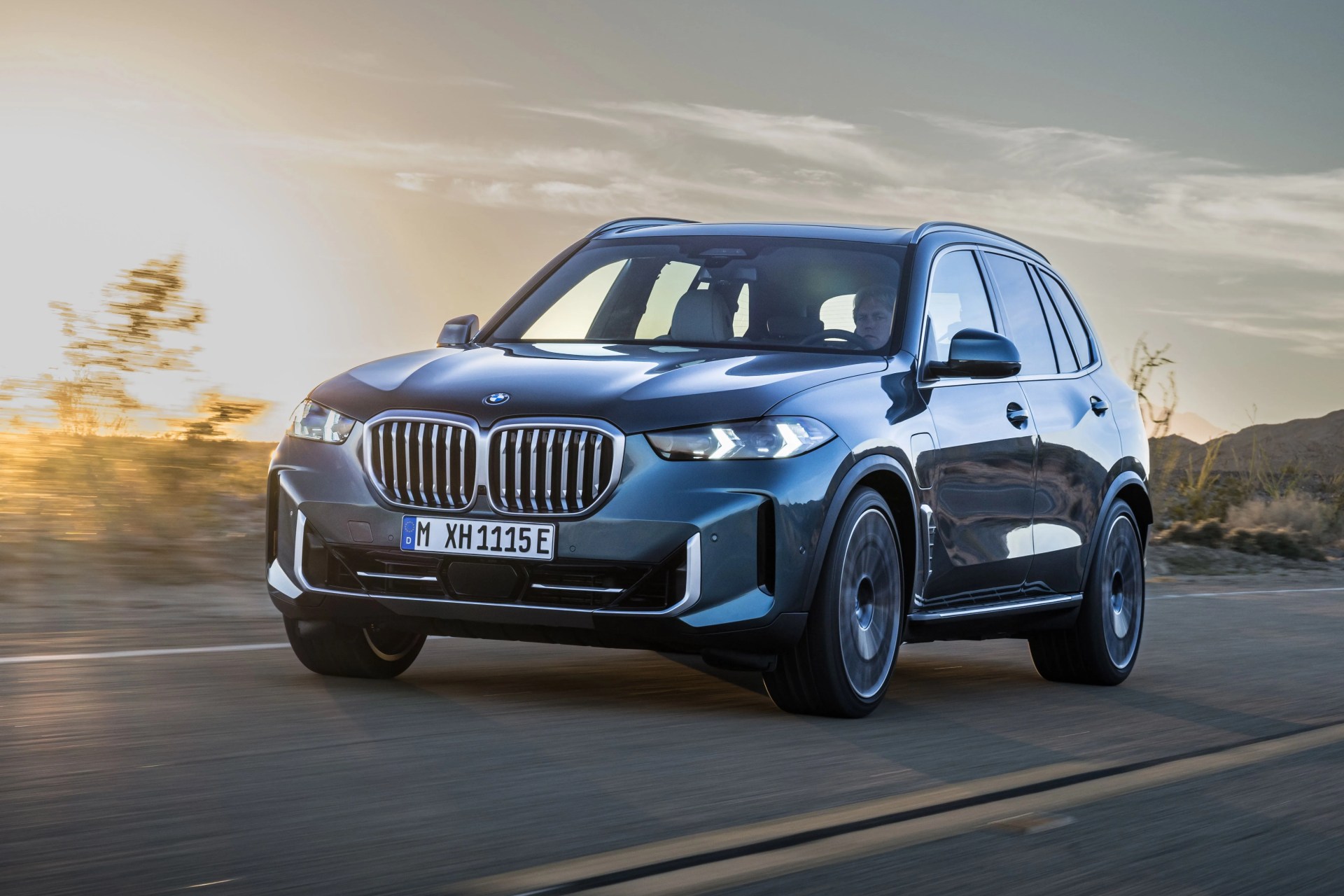 bmw x6 driving on road