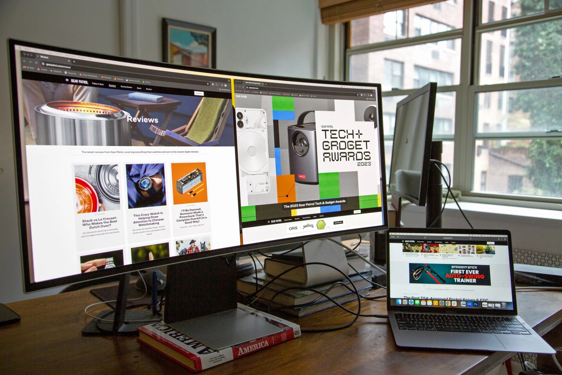 a laptop and a monitor on a desk