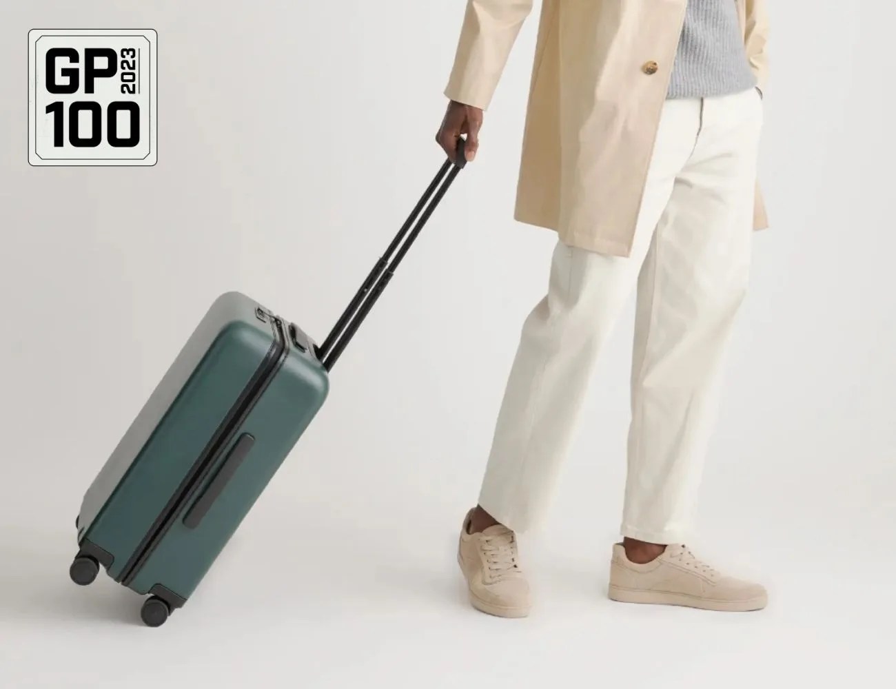 a person holding a suitcase