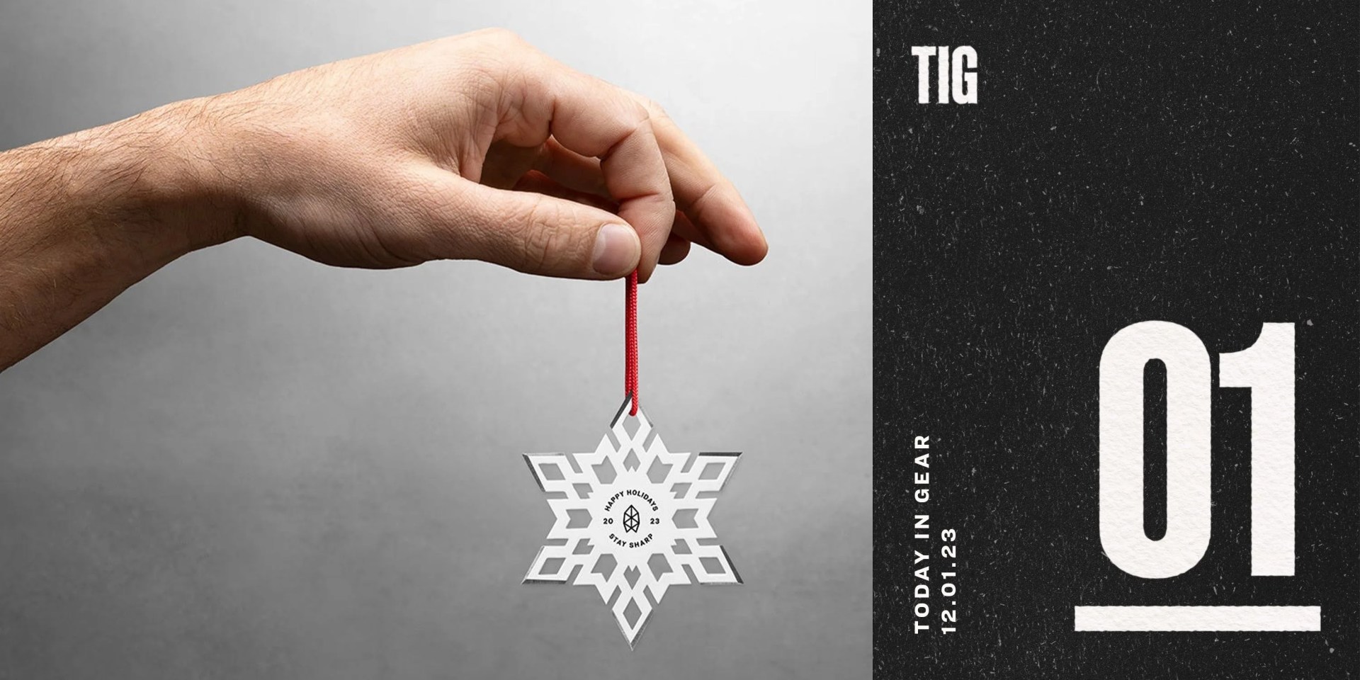 a hand holding a snowflake ornament