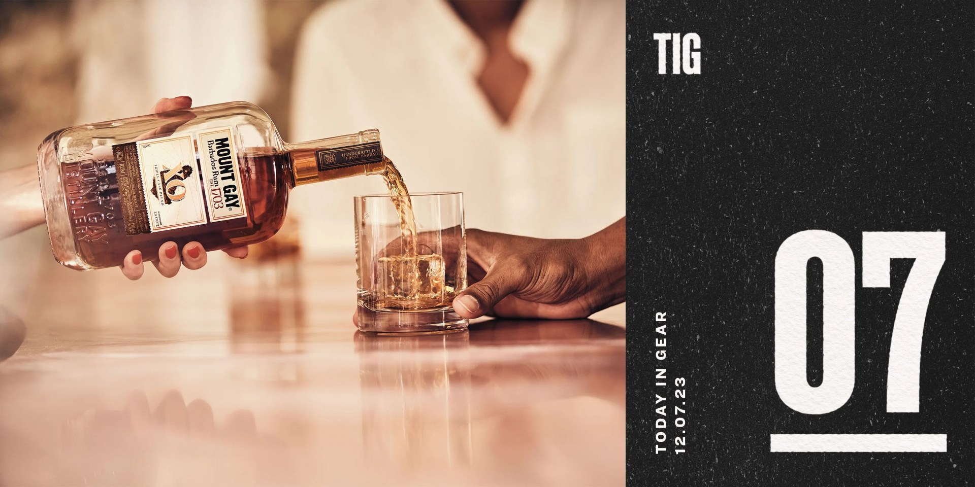 today in gear december 7 2023 a person pouring mount gay rum xo into a glass