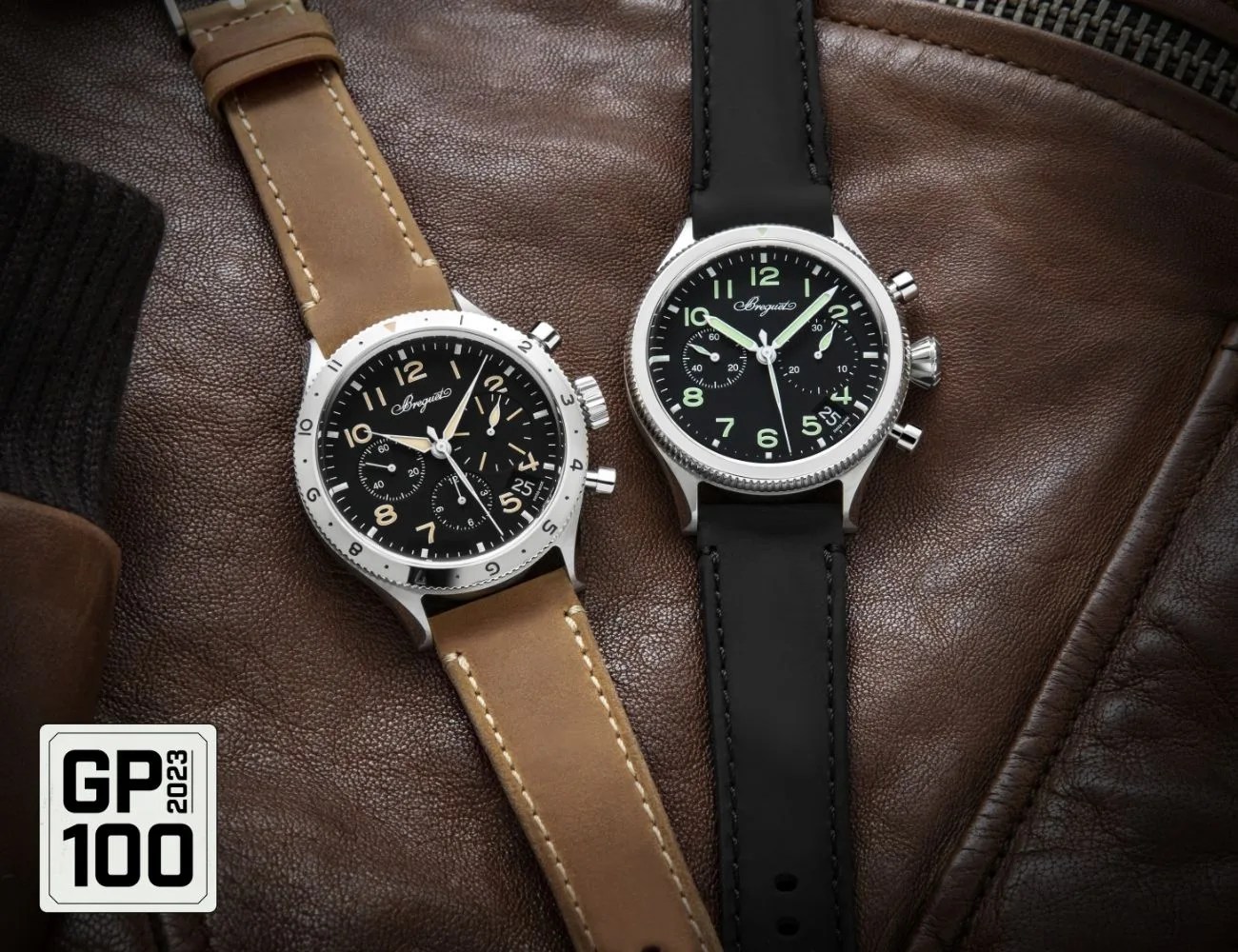a couple of watches on a leather surface